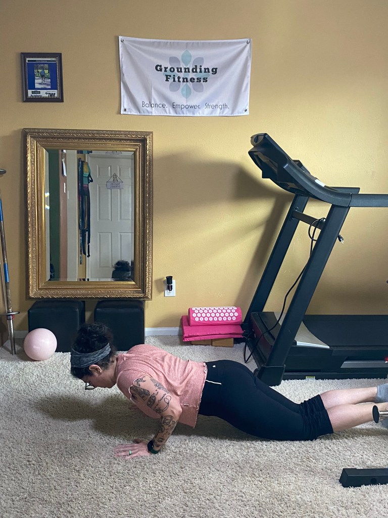 Carola doing a push up